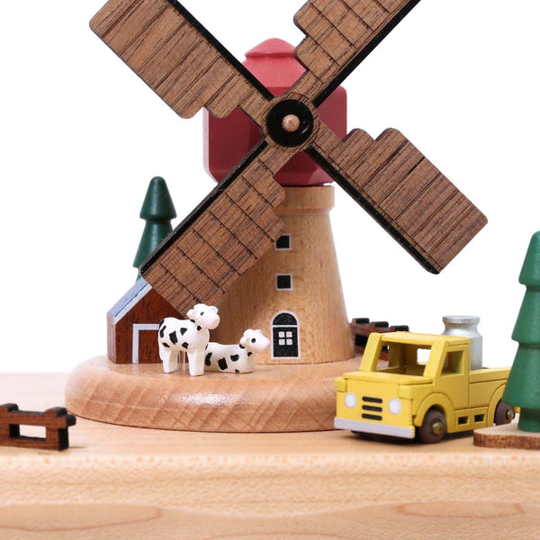 Windmill Farm With Trees and Cows