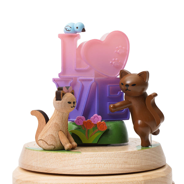 Two Cats With Tulips