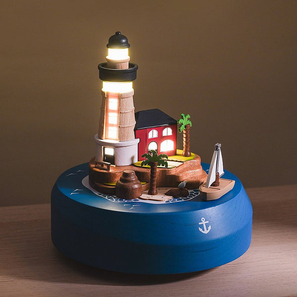 Sailboat And Lighthouse With Pulm Tree