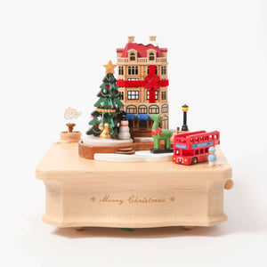 Christms City With Christmas Tree And Green Reindeer