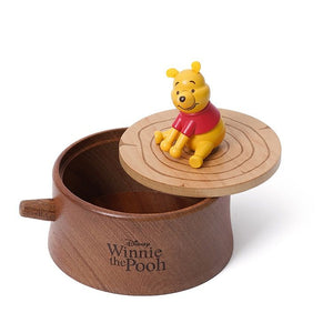 Winnie The Pooh Sitting On A Box